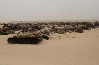 Illustration for article titled Gloomy tank graveyards hold the rusting bones of war